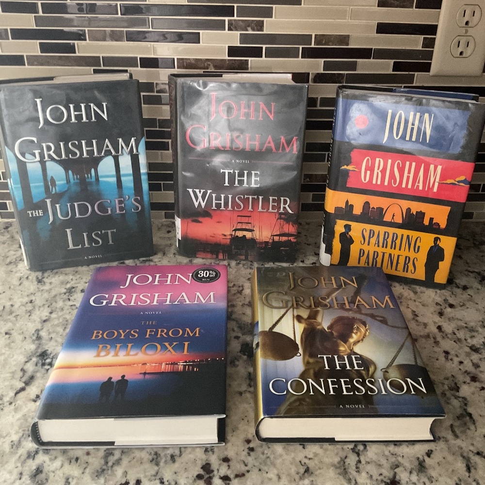 John Grisham hardback books.
